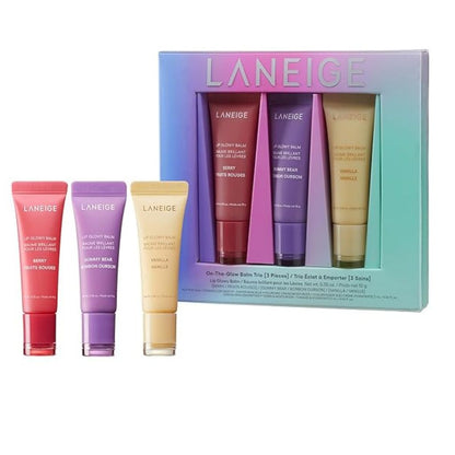 Laneige lip balm set with four tubes and a box on a white background