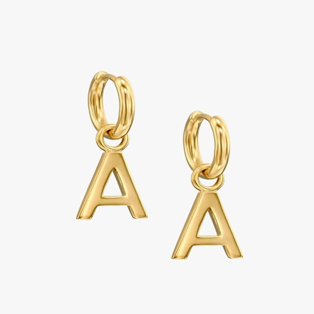 Gold hoop earrings with 'A' pendants on a white background