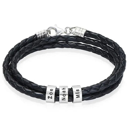 Black braided leather bracelet with silver name beads on a white background