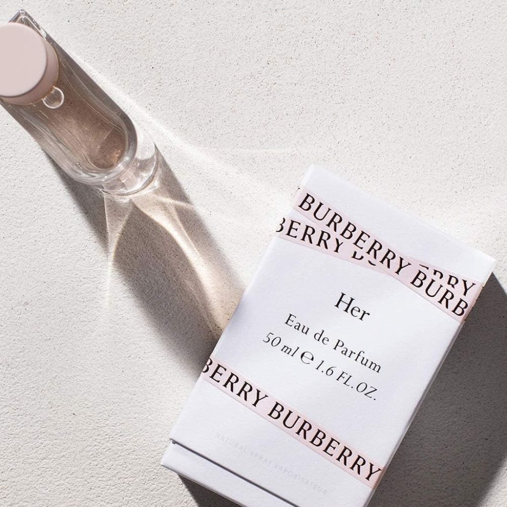 Burberry perfume bottle and packaging on a light background