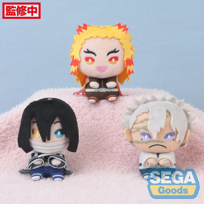 Three anime-style figurines on a pink cushion with 'SEGA Goods' branding.