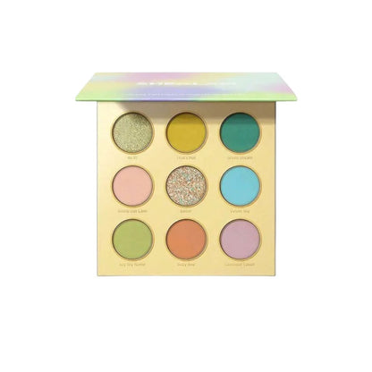 Makeup palette with colorful eyeshadows on a white background