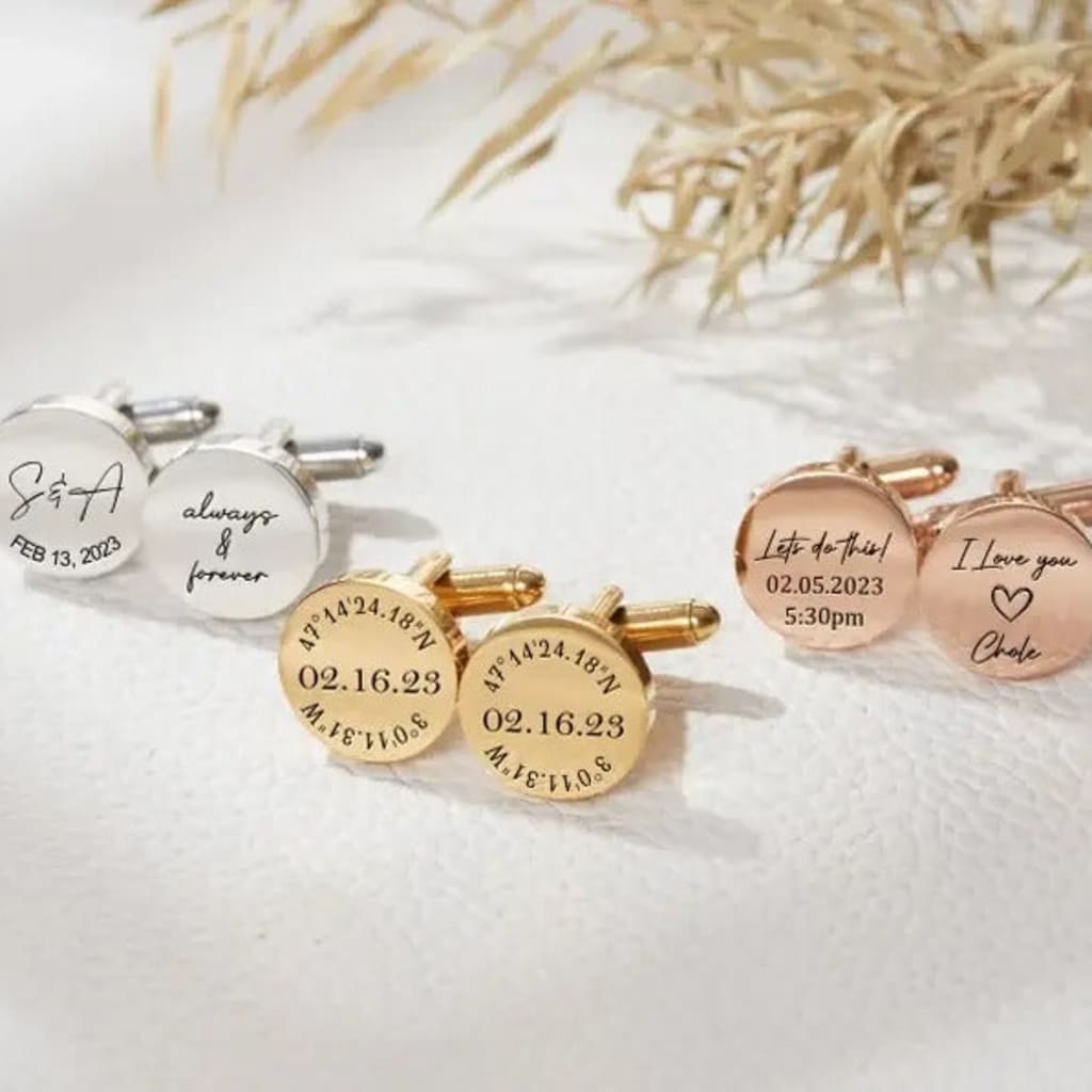 Set of personalized cufflinks on a light background