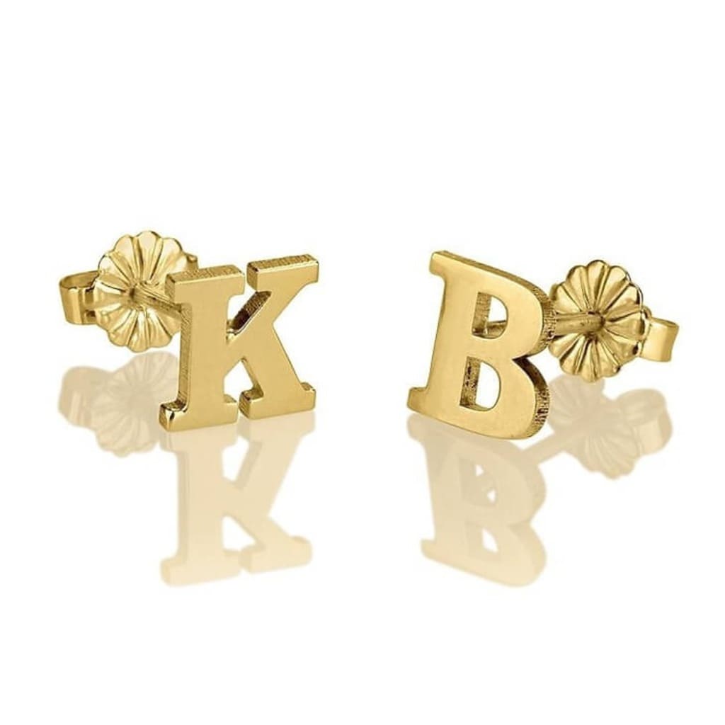 Gold letter 'K' and 'B' earrings on a white background