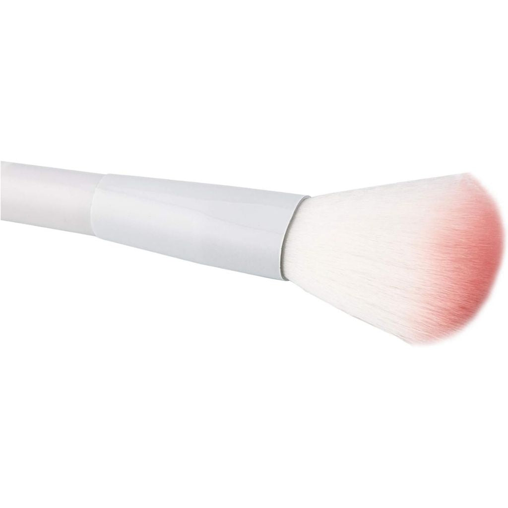 Makeup brush with pink bristle tip on a white background