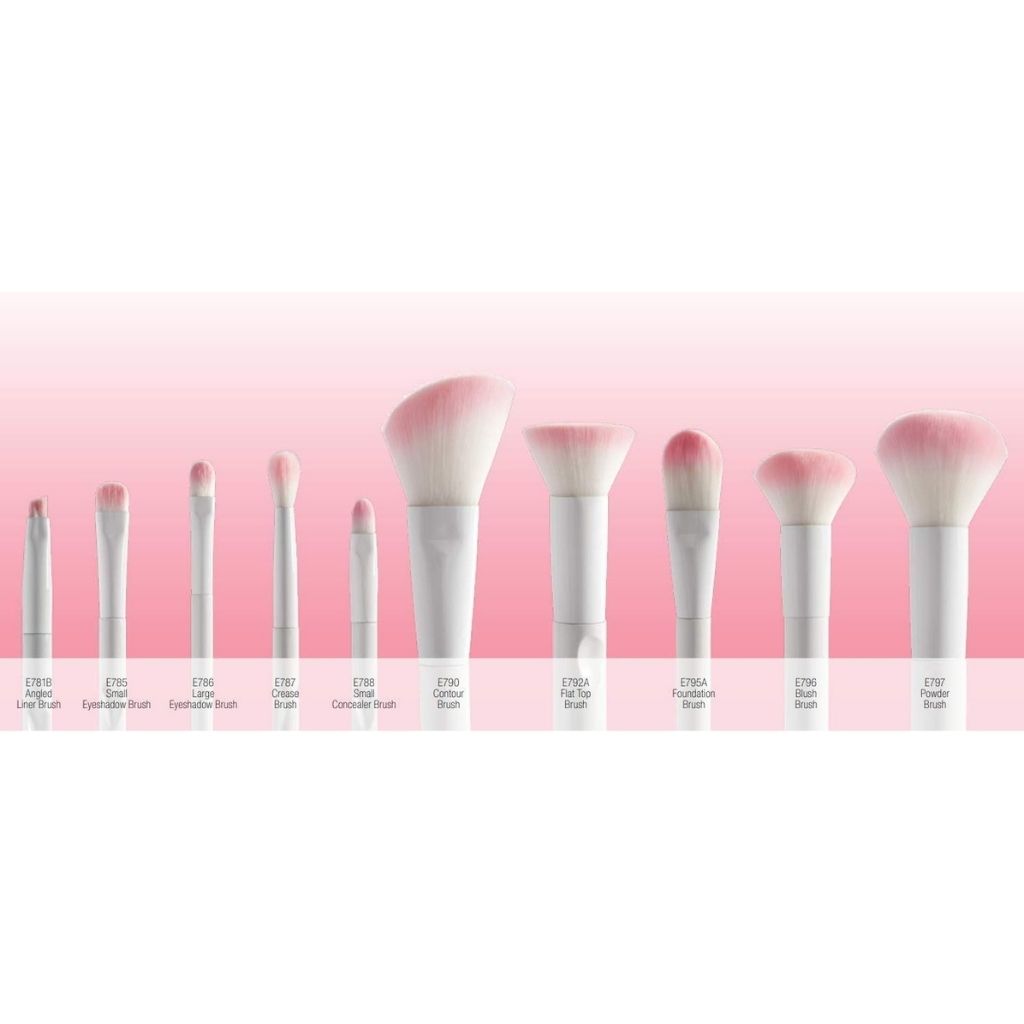 Set of makeup brushes with pink gradient background
