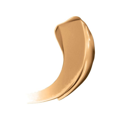 Beige cosmetic cream swatch on a white background