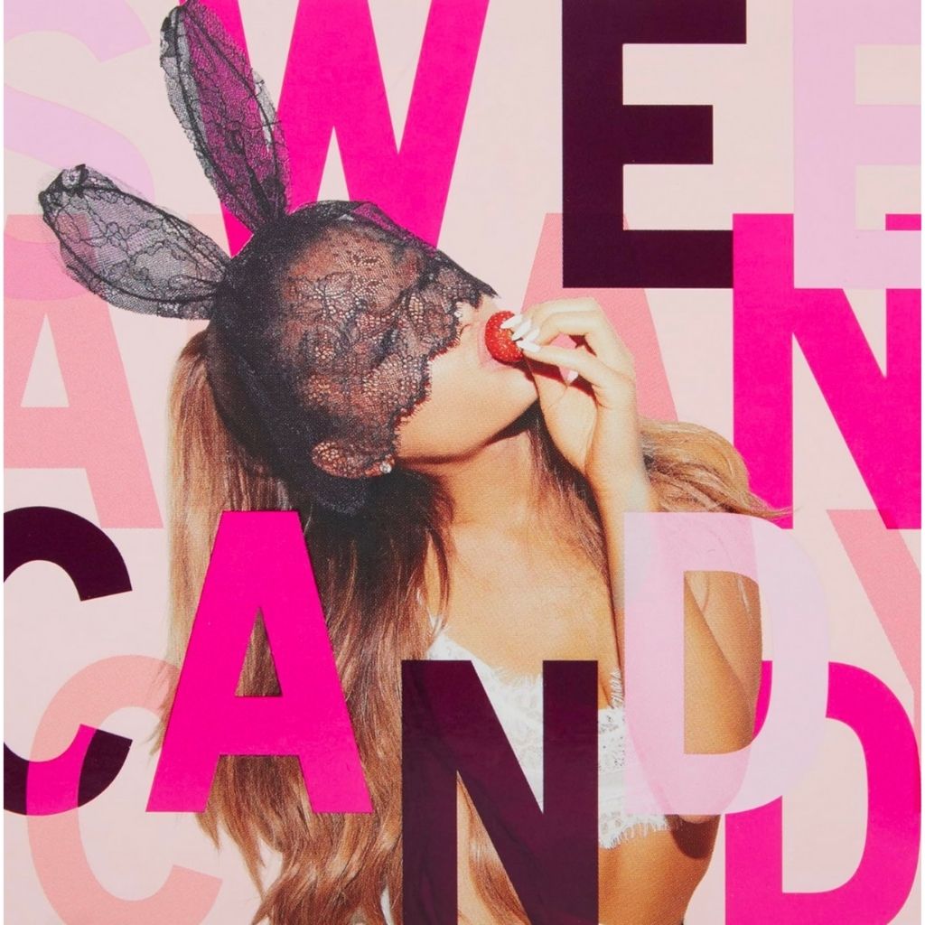Woman wearing bunny ears and a red apple with text overlay on a pink background
