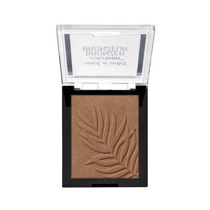 Bronzer with leaf design in a compact case on a white background