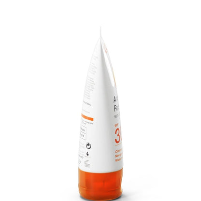 Sunscreen bottle with white cap and orange body on a white background