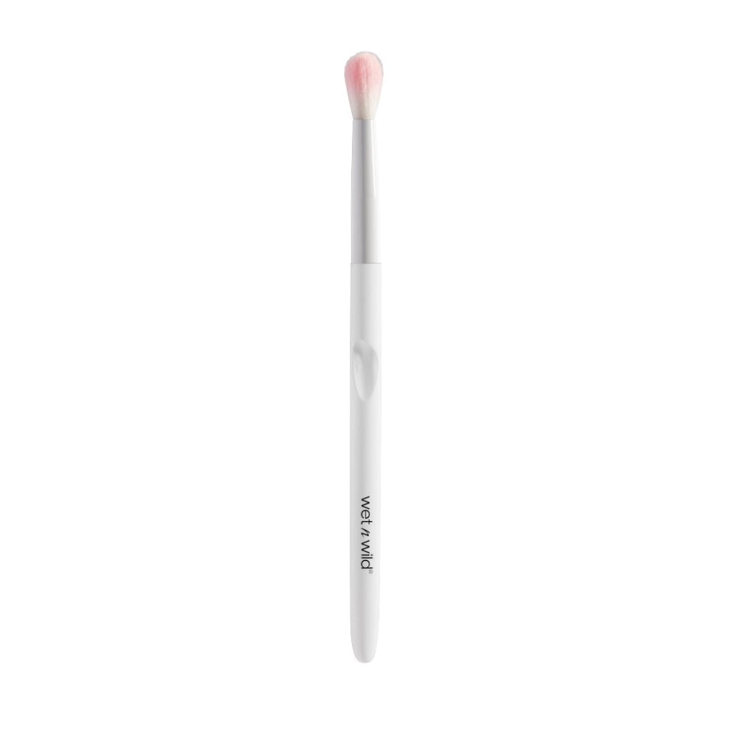 Makeup brush with pink bristle tip on a white background, branded 'NetaWardrobe'.