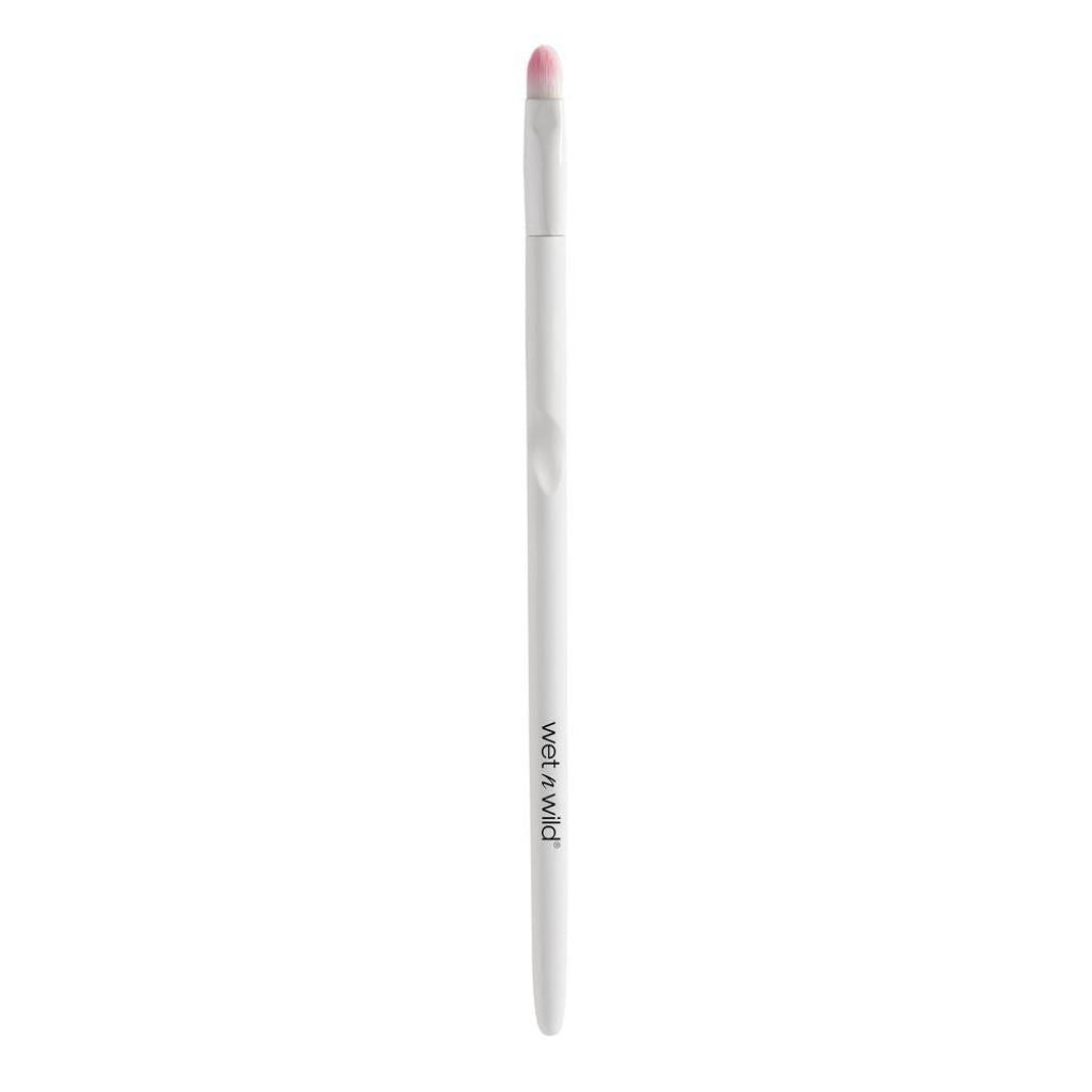 White makeup pencil with pink cap on a white background