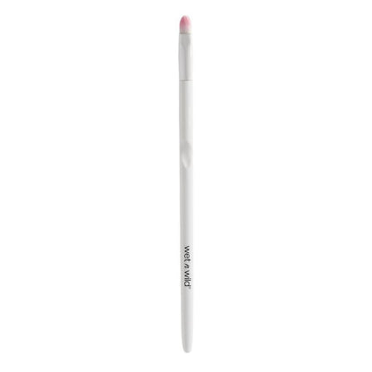 White makeup pencil with pink cap on a white background