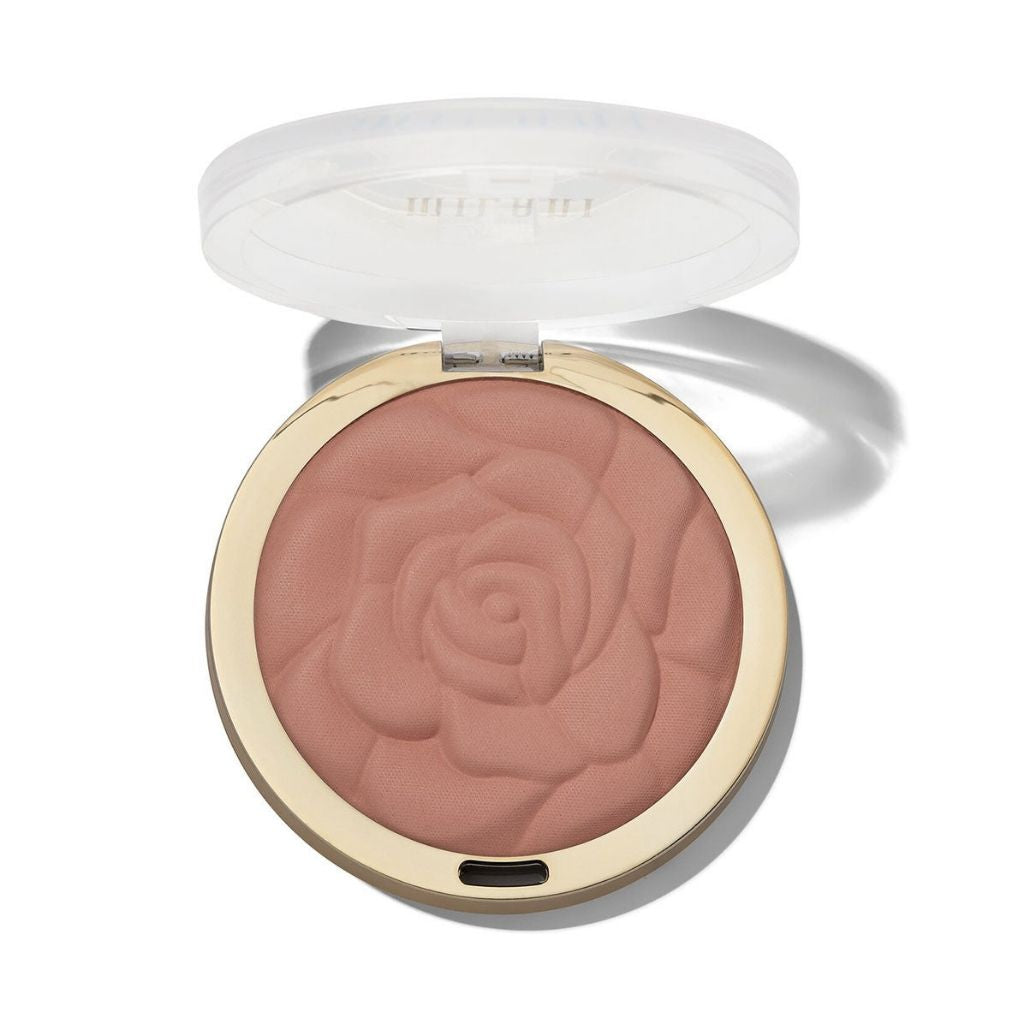 Compact blush with rose design on a white background
