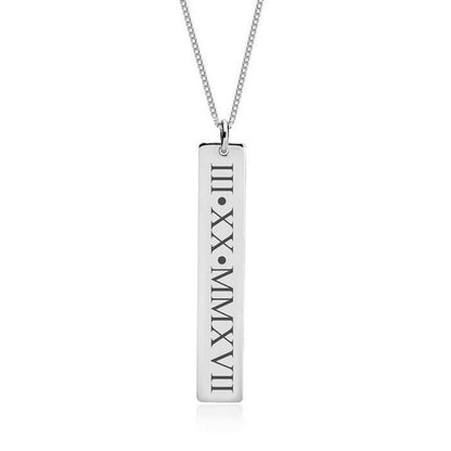 Silver necklace with a rectangular pendant displaying Roman numerals on a white background