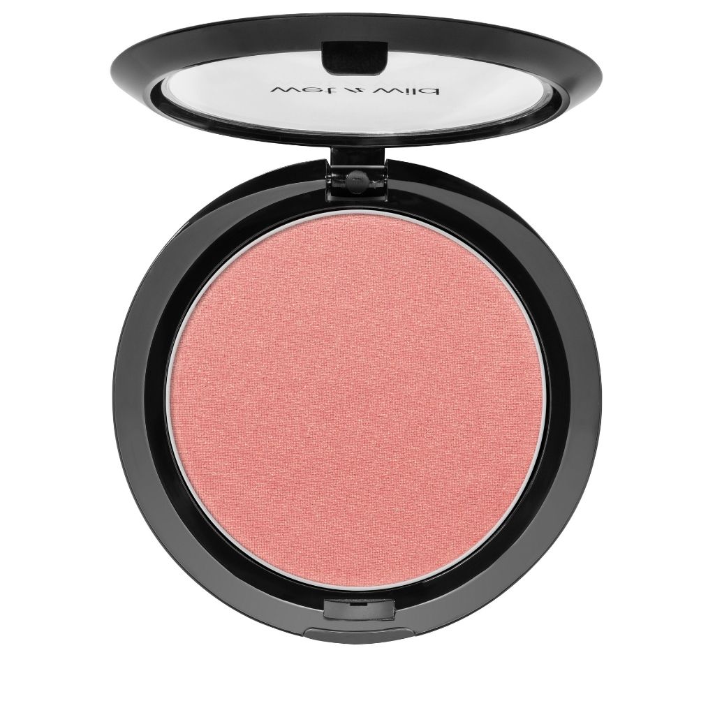 Compact blush in a black case on a white background