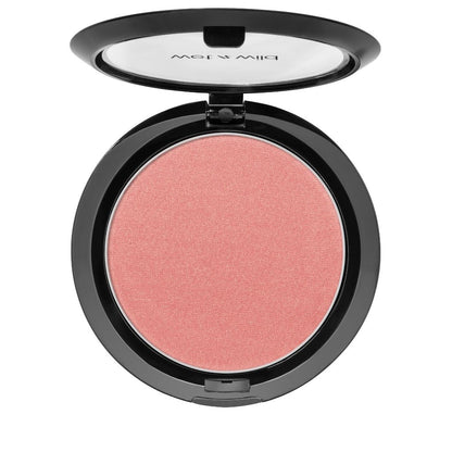 Compact blush in a black case on a white background