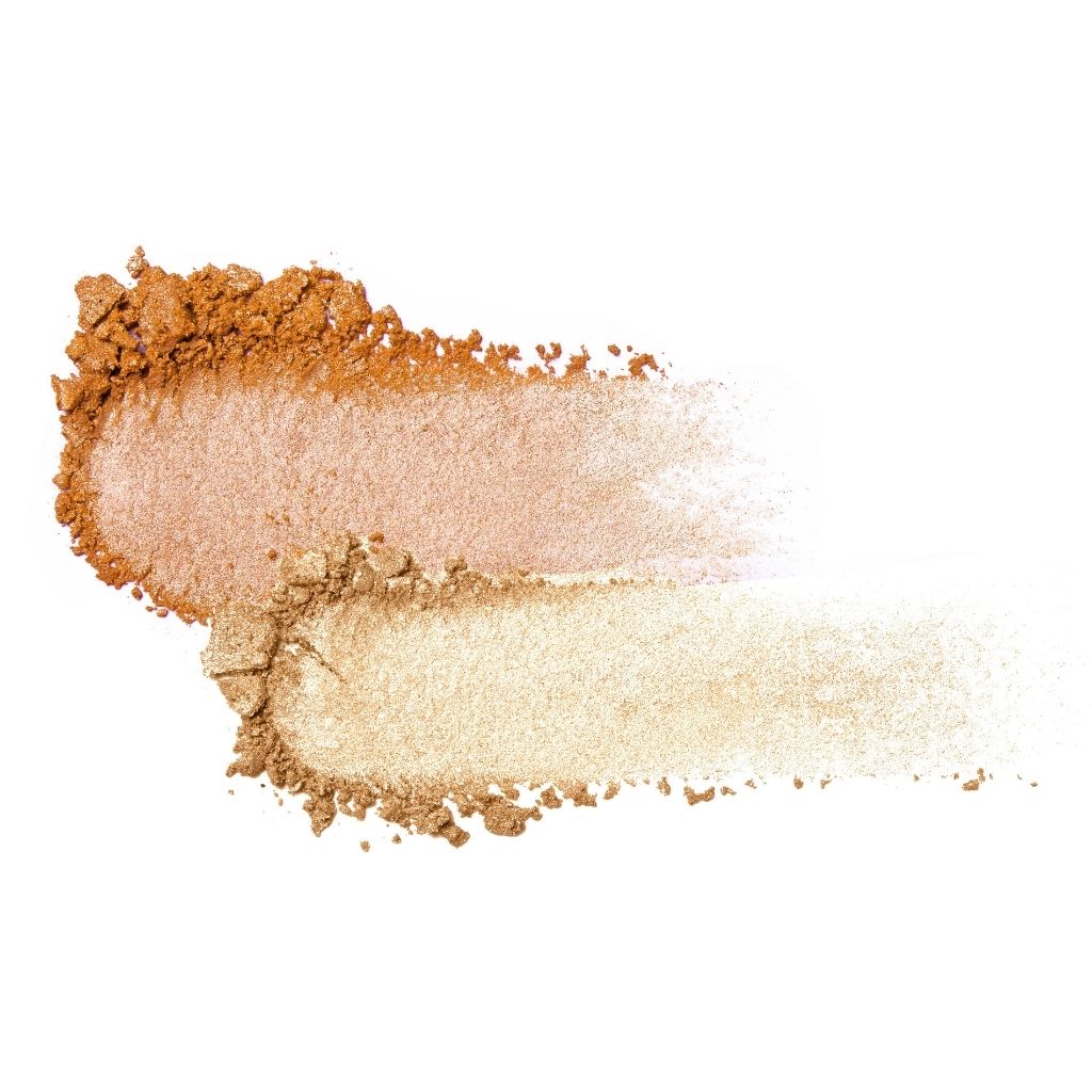 Makeup swatch with brown, beige, and white powder on a white background