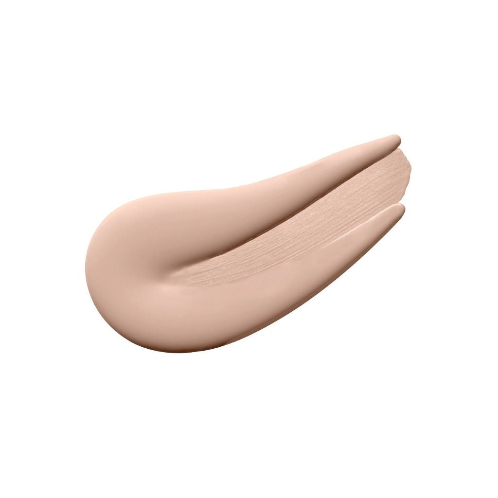Beige makeup swatch on a white background