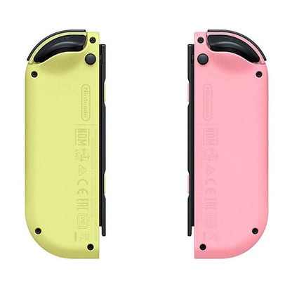 Two colorful handheld gaming consoles, one yellow and one pink, on a white background.