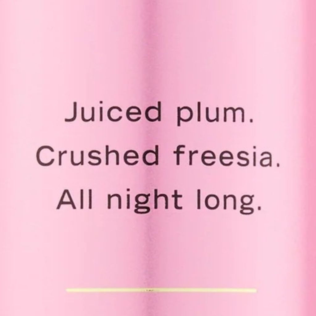 Pink background with black text reading 'Juiced plum. Crushed freesia. All night long.'