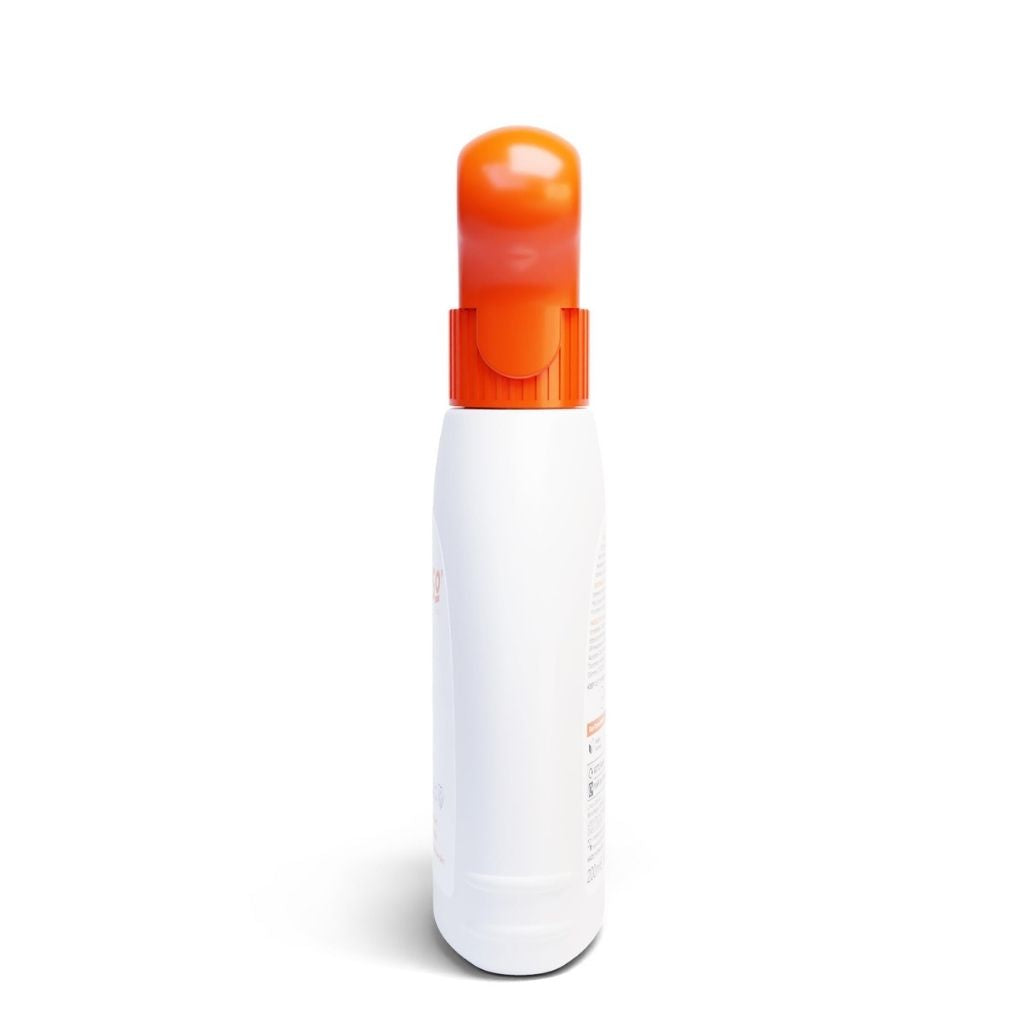 White spray bottle with an orange nozzle on a white background