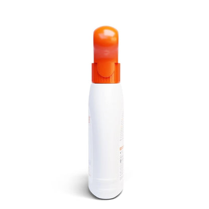 White spray bottle with an orange nozzle on a white background