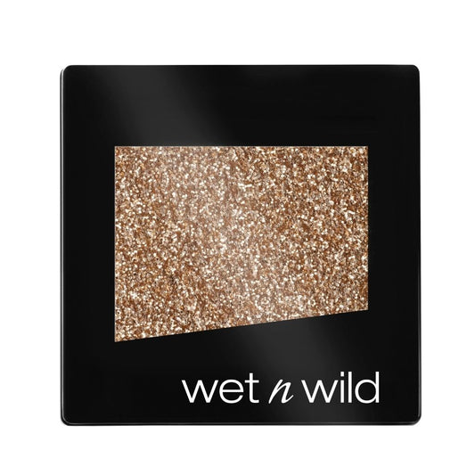 Glittery eyeshadow palette with 'Wet n Wild' branding on a black background