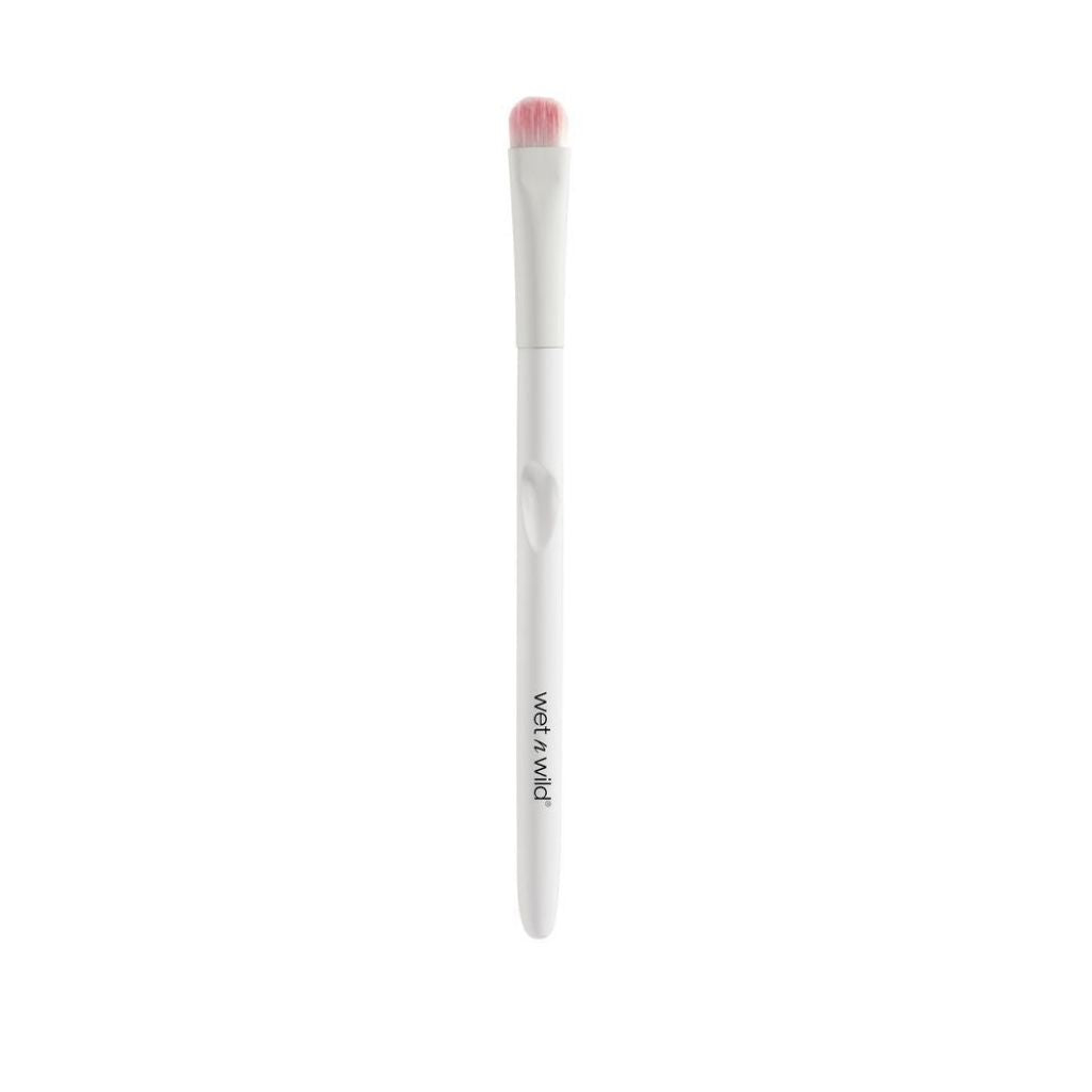 Makeup brush with pink bristle tip on a white background