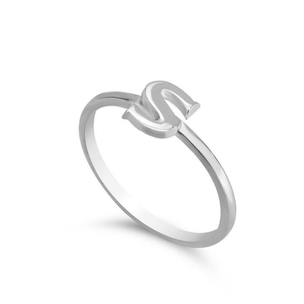 Silver ring with a letter 'S' on a white background