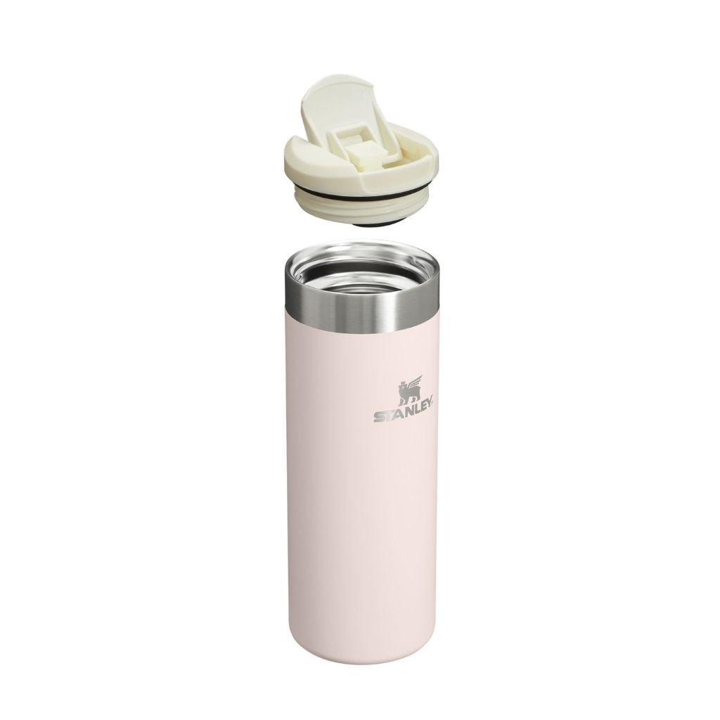 Pink insulated bottle with white lid on a white background