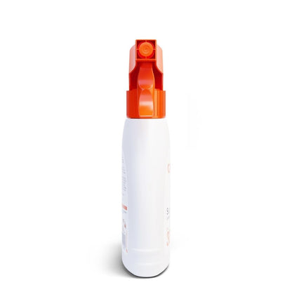 White spray bottle with an orange nozzle on a white background