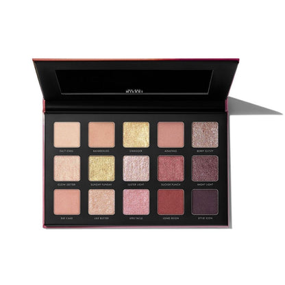 Makeup palette with various shades on a white background