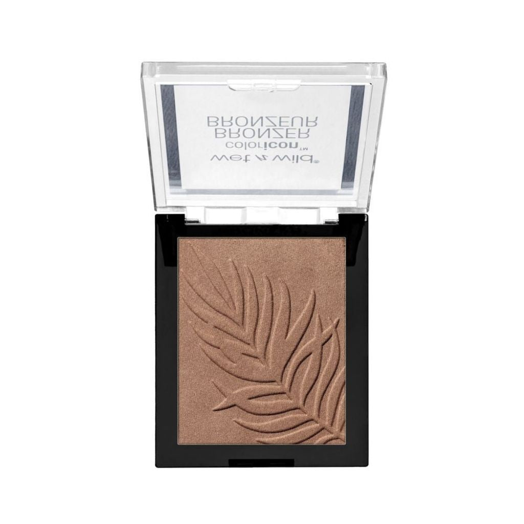 Bronzer with leaf design in a compact case on a white background