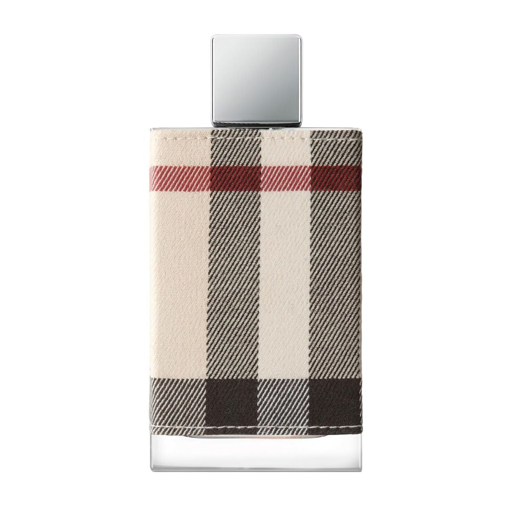 Perfume bottle with checkered design on a white background