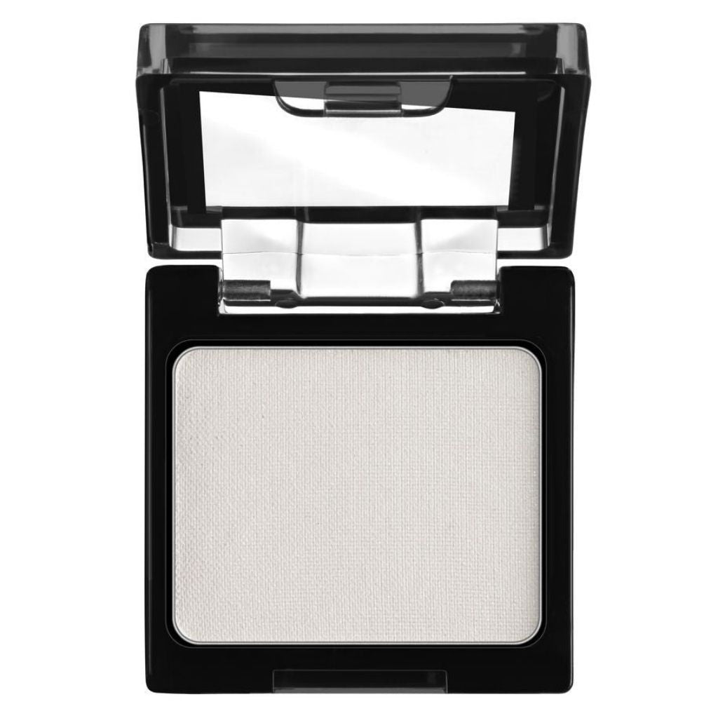 Compact powder in a black case with a mirror on a white background