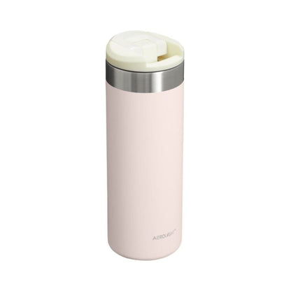 Pink thermos bottle with silver lid on a white background