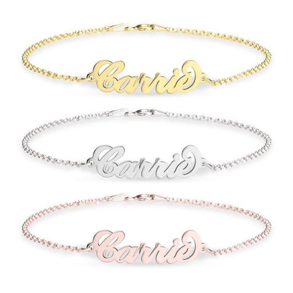 Three name bracelets in gold, silver, and rose gold on a white background