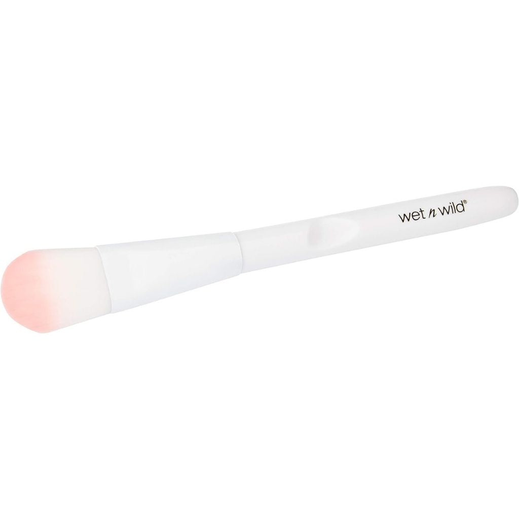 White makeup brush with pink bristle tip on a white background, featuring 'Wet n Wild' branding.