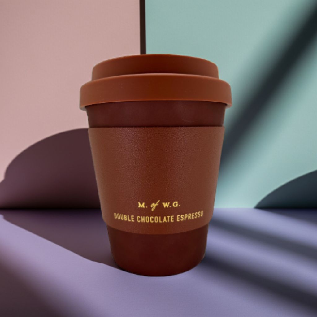 Brown coffee cup with lid on a gradient background