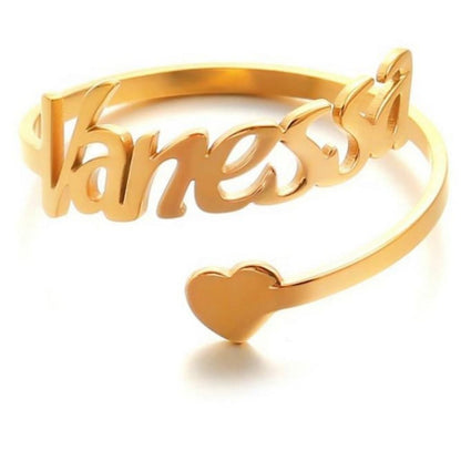 Gold name bracelet with 'Vanessa' on a white background