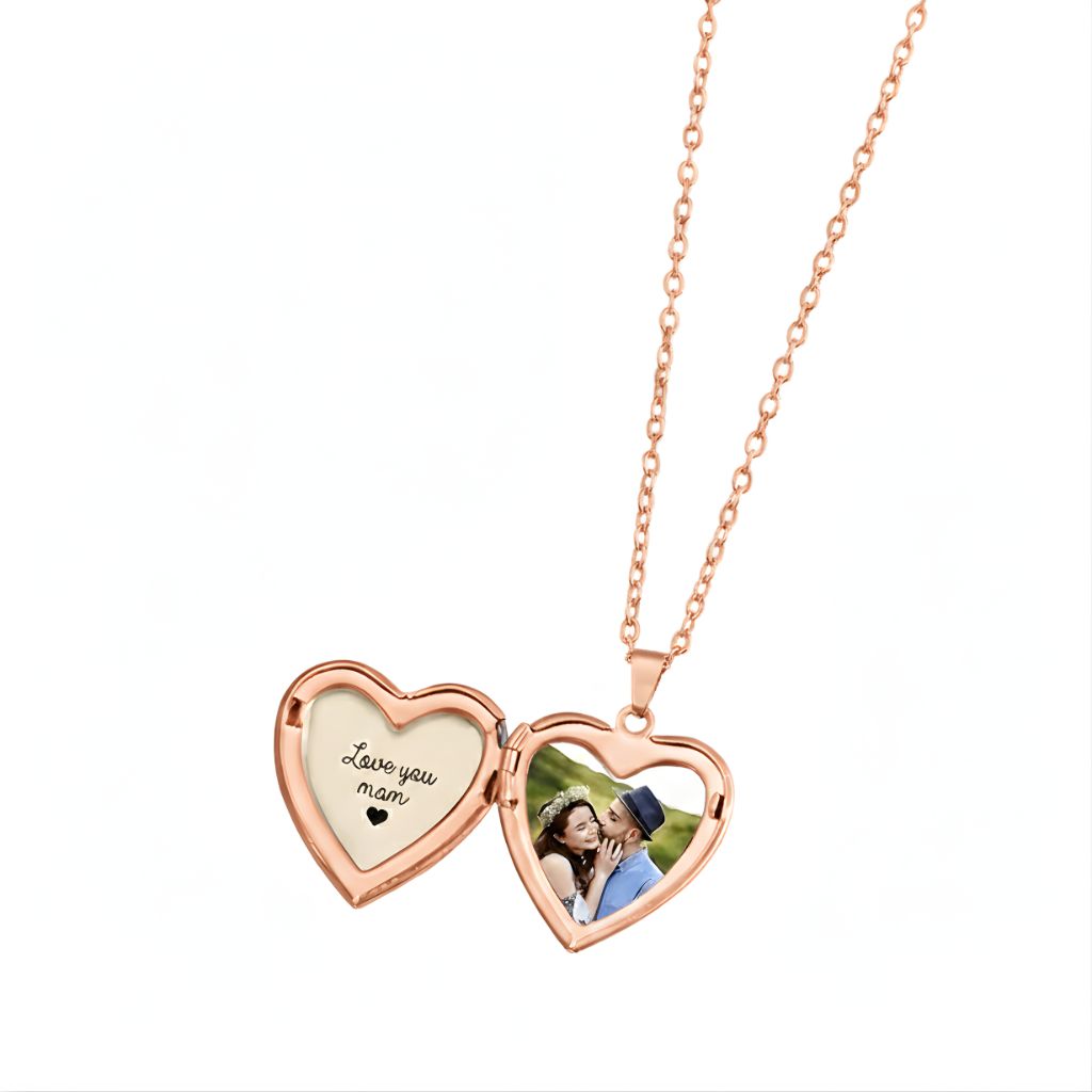 Heart-shaped locket with 'Love you mom' engraving and a photo of a couple on a white background