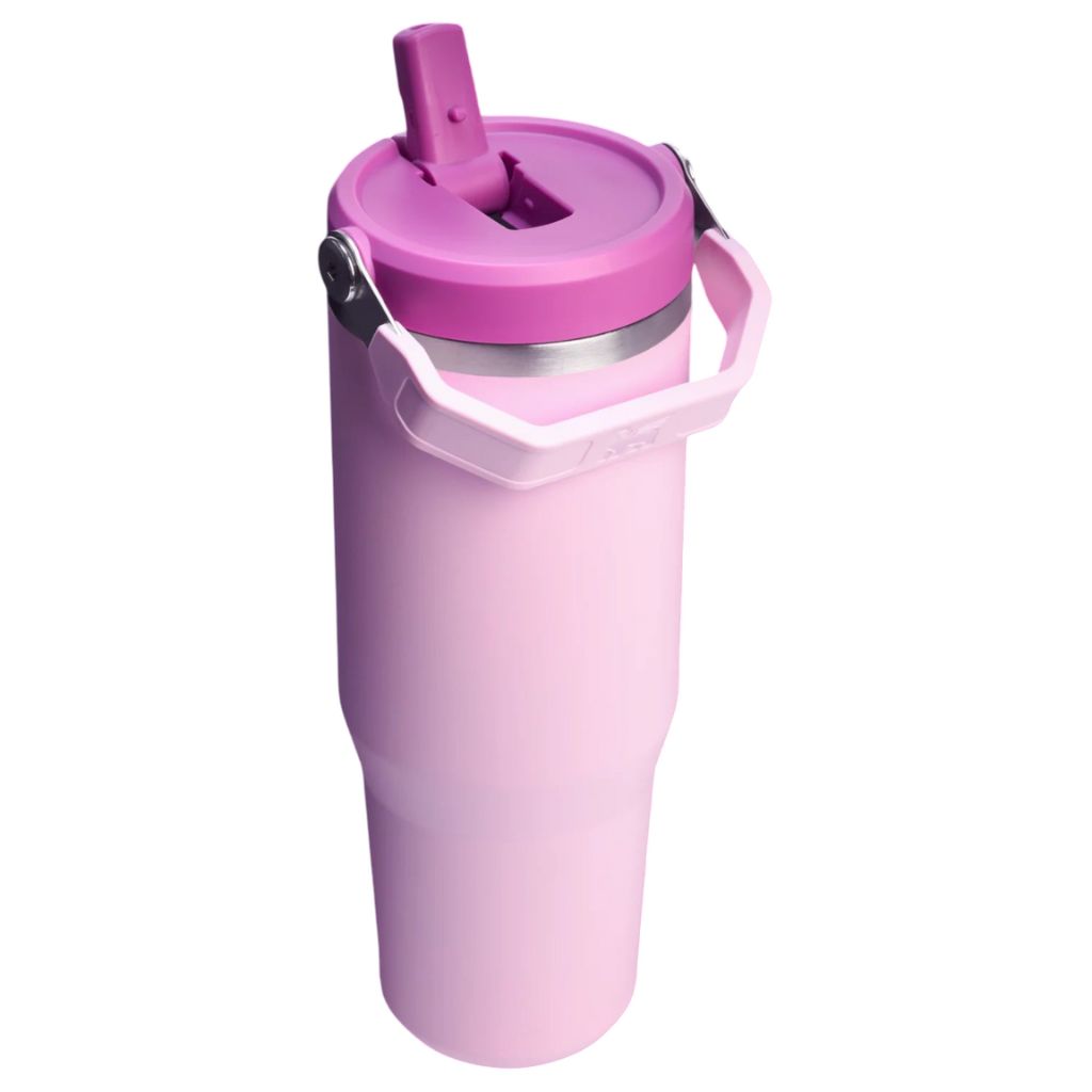 Pink water bottle with a straw on a white background