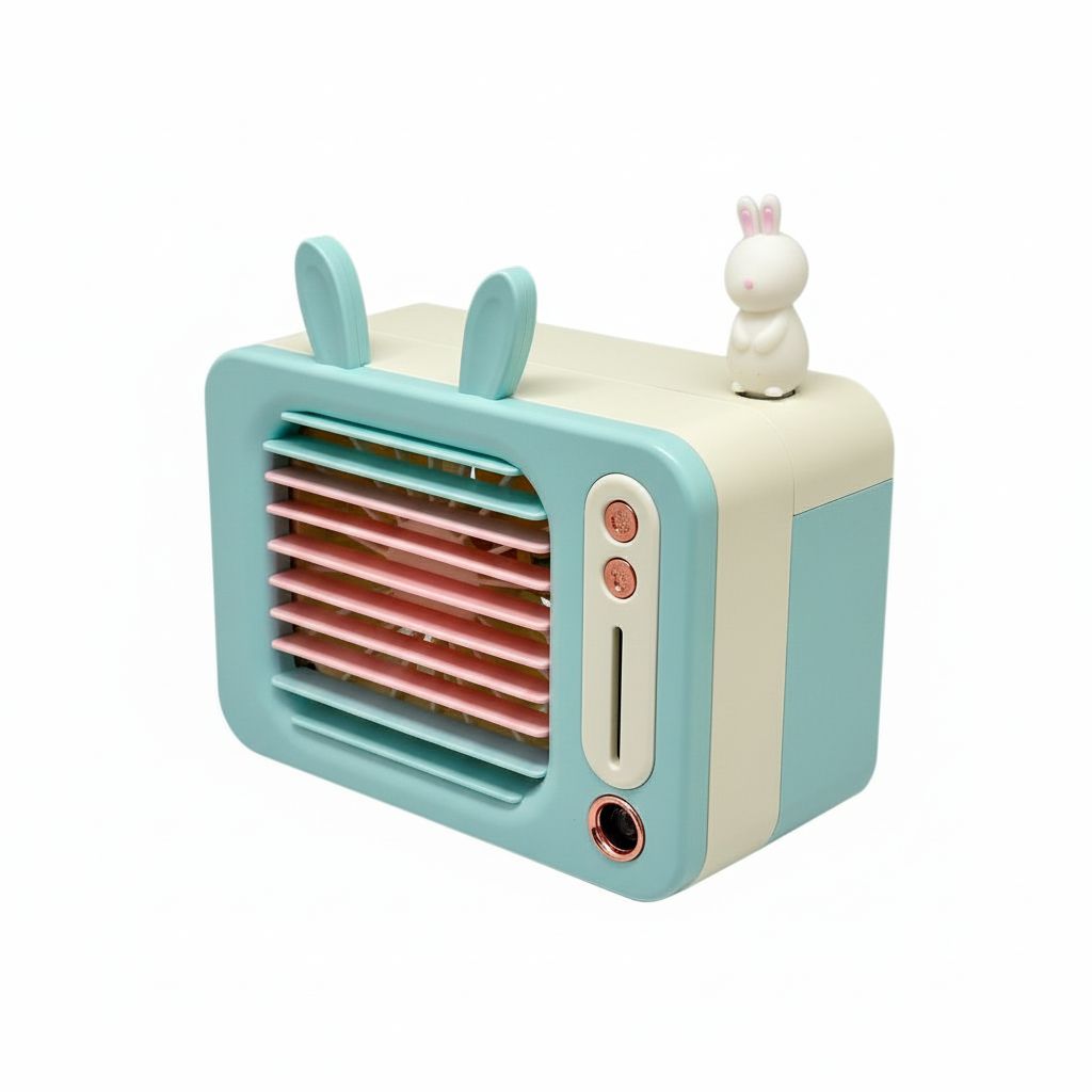 Toy television set with rabbit ears and a small rabbit figure on a white background