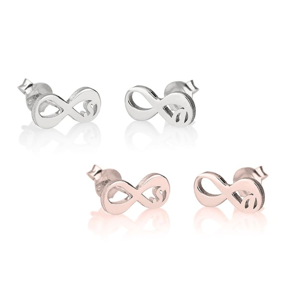 Set of four infinity symbol earrings in silver and rose gold on a white background