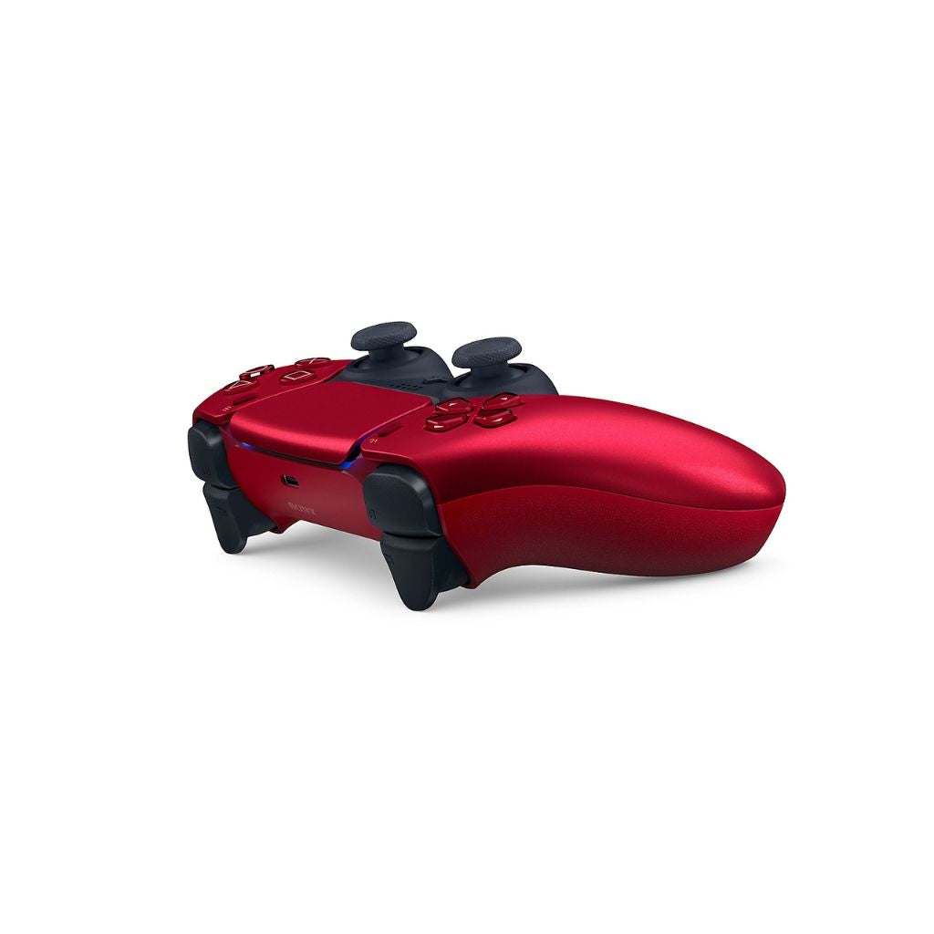 Red gaming controller on a white background
