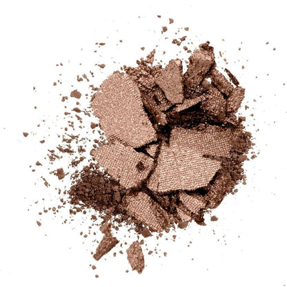 Shattered brown makeup powder on a white background