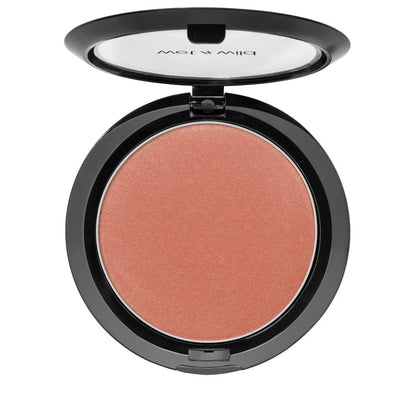 Compact blush in a black case on a white background