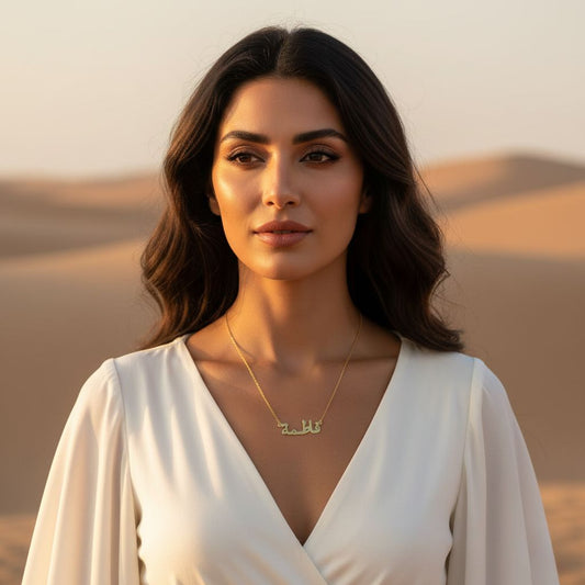 Woman in a white dress with a gold necklace against a desert background