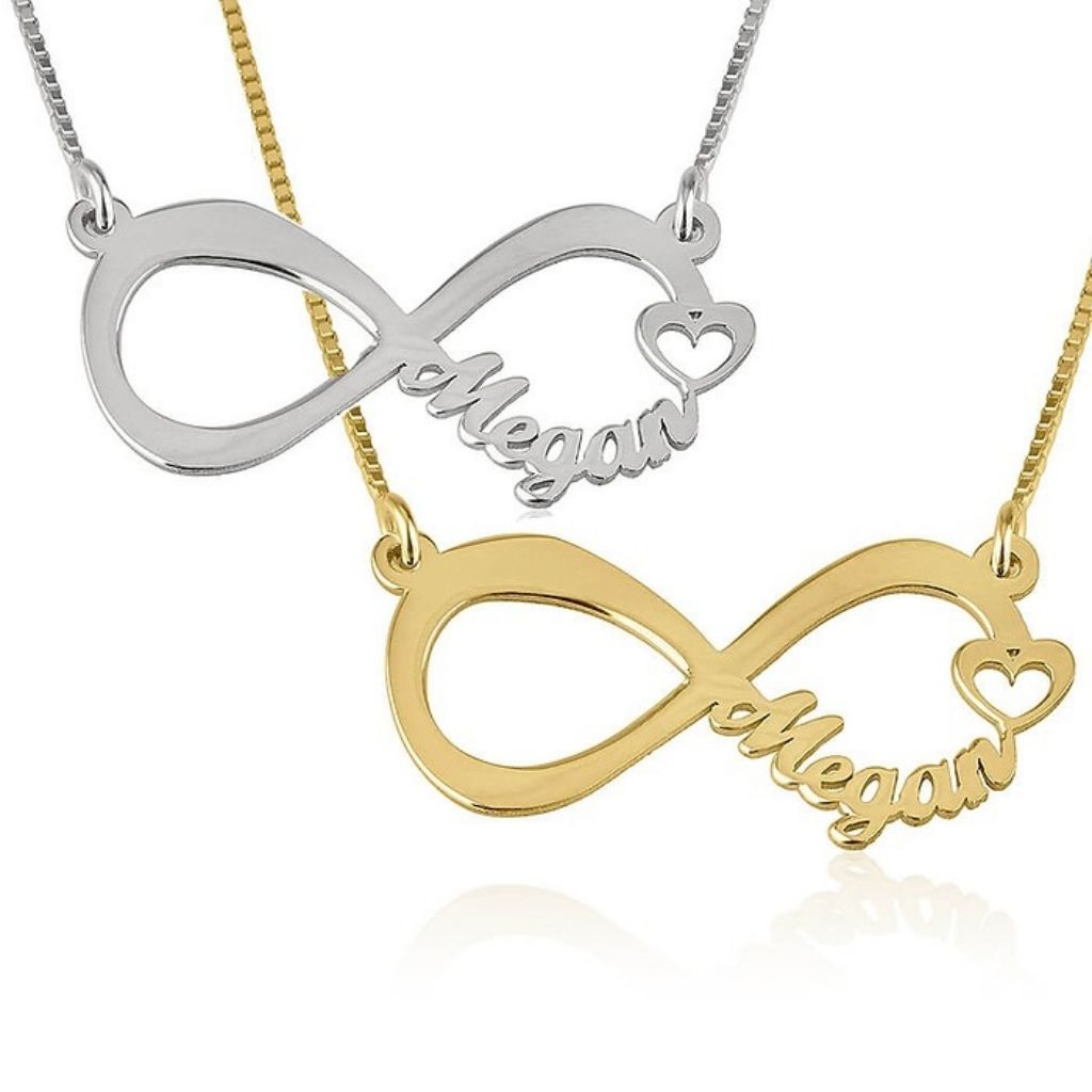 Two infinity-shaped necklaces with 'Megan' engraved, one gold and one silver, on a white background.